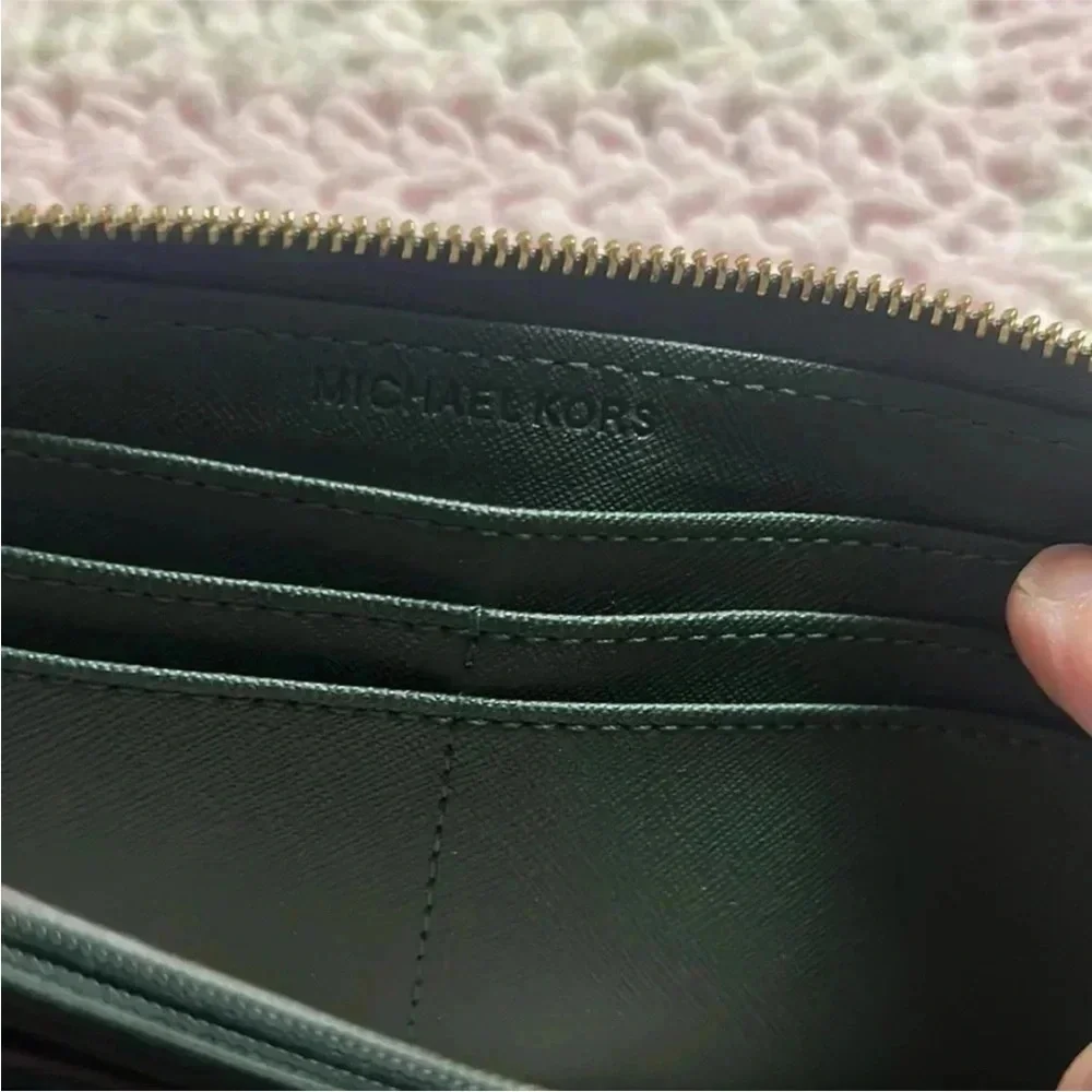 - Michael Kors green large wallet
